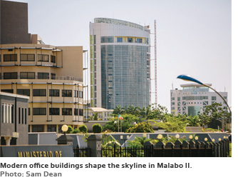 Modern office buildings shape the skyline in Malabo II. Photo: Sam Dean